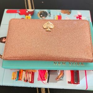 Kate spade Lacey rose gold glitter never used wallet with original box!